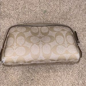 a tan coach little bag